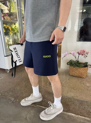 Gucci yellow lettering patch shorts
